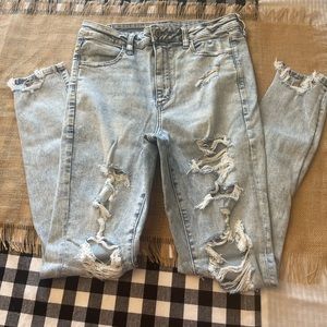 Americans Eagle Ne(x)t level stretch light wash destructed jeans. Size 12 long.